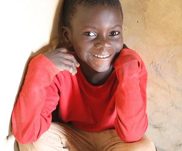 Boy in red shirt