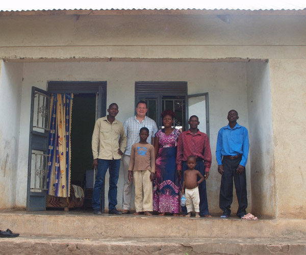 Allan outside his home